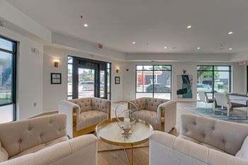 A white room with a table and chairs.